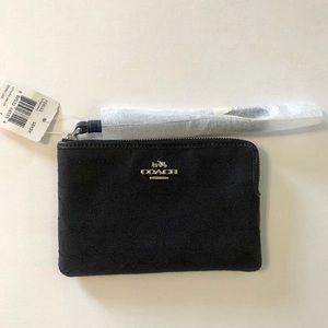 NWT. Coach Small wallet wristlet. Fabric logo.